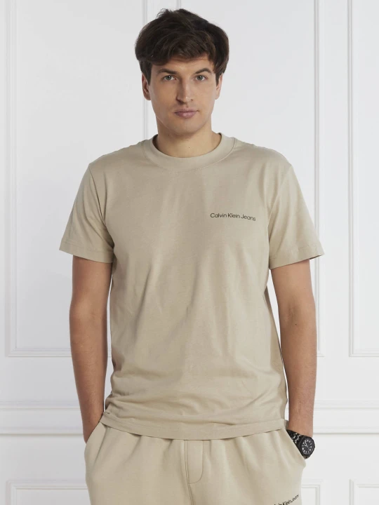 Zdjęcie produktu Calvin Klein Jeans T-shirt LOGO TAPE | Regular Fit beżowy