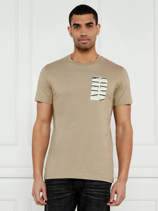Zdjęcie produktu Calvin Klein Jeans T-shirt Serif Box Graphic | Regular Fit beżowy