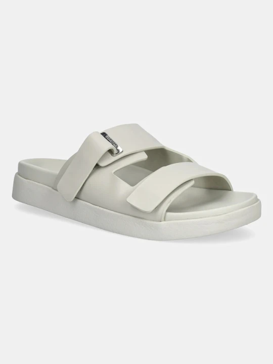 Zdjęcie produktu Calvin Klein klapki skórzane FLAT ADJ SLIDE EYELET beżowy
