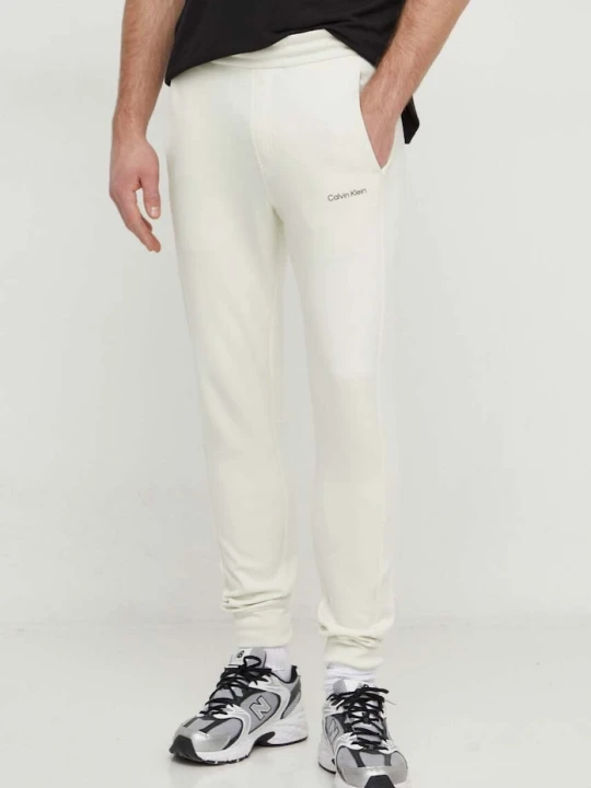 Zdjęcie produktu Calvin Klein spodnie dresowe beżowy