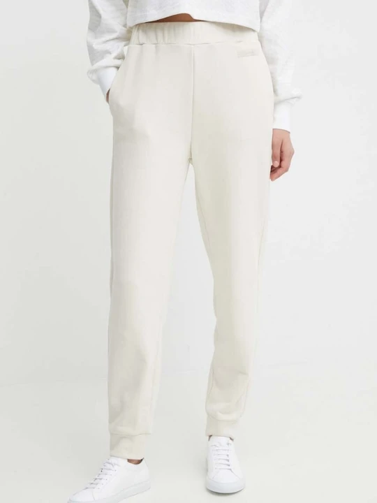 Zdjęcie produktu Calvin Klein spodnie dresowe beżowy