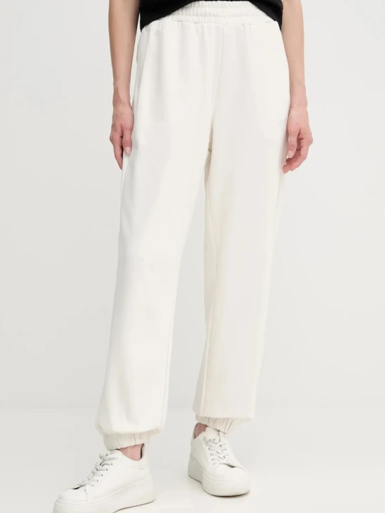 Zdjęcie produktu Calvin Klein spodnie dresowe bawełniane beżowy