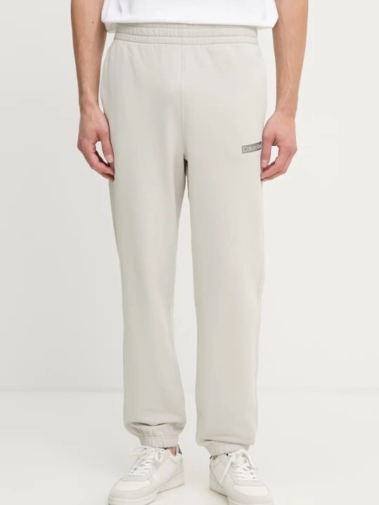 Zdjęcie produktu Calvin Klein spodnie dresowe męskie bawełniane szary