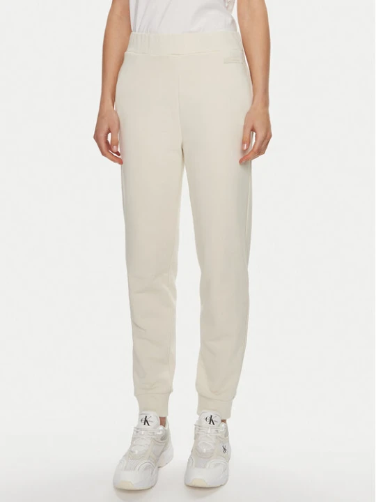 Zdjęcie produktu Calvin Klein Spodnie dresowe Micro Logo K20K206632 Écru Regular Fit Kremowy
