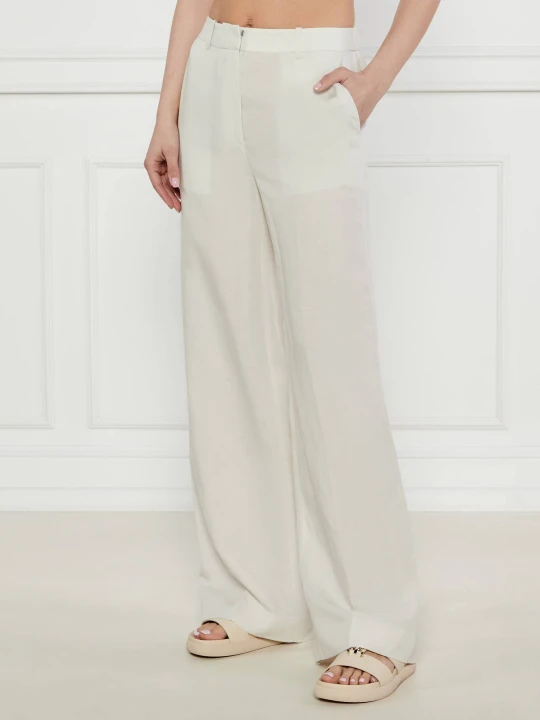 Zdjęcie produktu Calvin Klein Spodnie | flare fit | z dodatkiem lnu beżowy