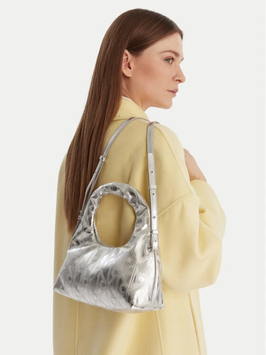Zdjęcie produktu Calvin Klein Torebka Puffy Aop Mini Bag With Strap LV04F3444G Srebrny