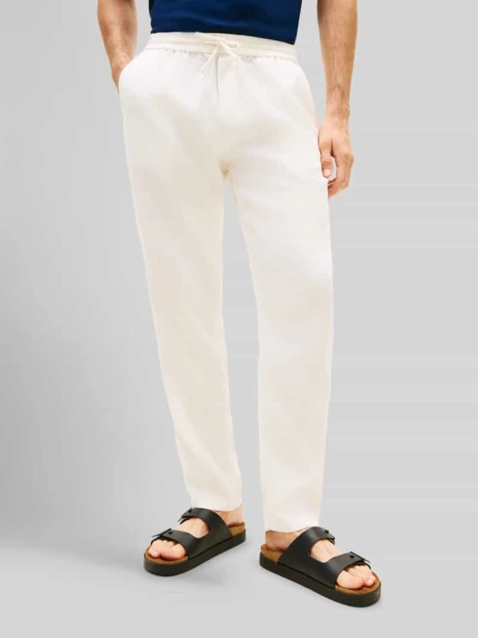 Zdjęcie produktu Chino o kroju tapered z mieszanki lnu ze ściągaczem w pasie model 'HARLEM' Tommy Hilfiger Złamany biały