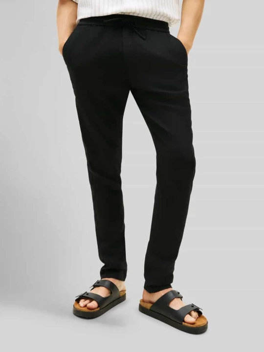 Zdjęcie produktu Chino o kroju tapered z mieszanki lnu ze ściągaczem w pasie model 'HARLEM' Tommy Hilfiger Czarny