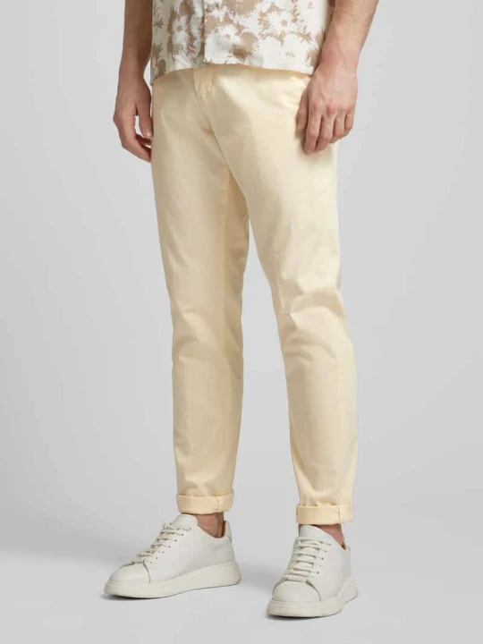 Zdjęcie produktu Chinosy o kroju slim fit z lamowanymi kieszeniami model 'CHELSEA' Tommy Hilfiger Złamany biały