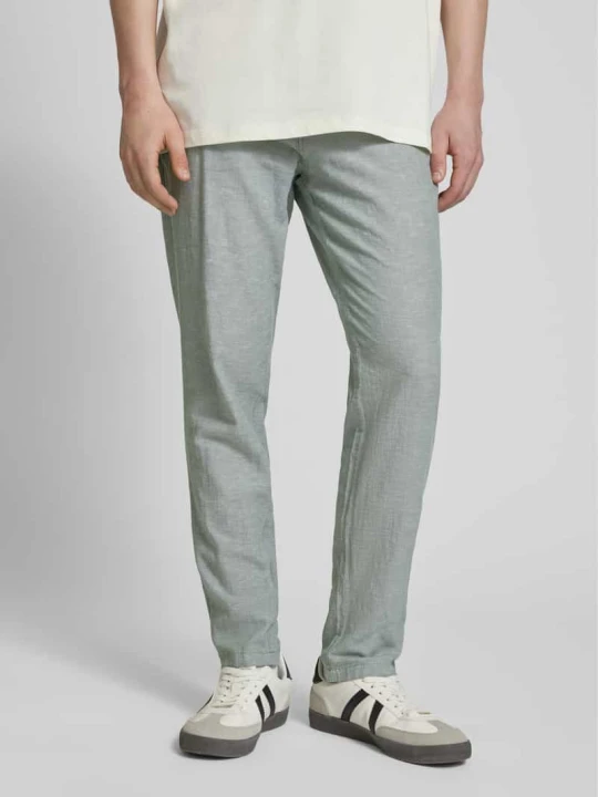 Zdjęcie produktu Chinosy o kroju tapered fit z wpuszczanymi kieszeniami model ‘STACE’ Jack&Jones Jasnozielony melanż