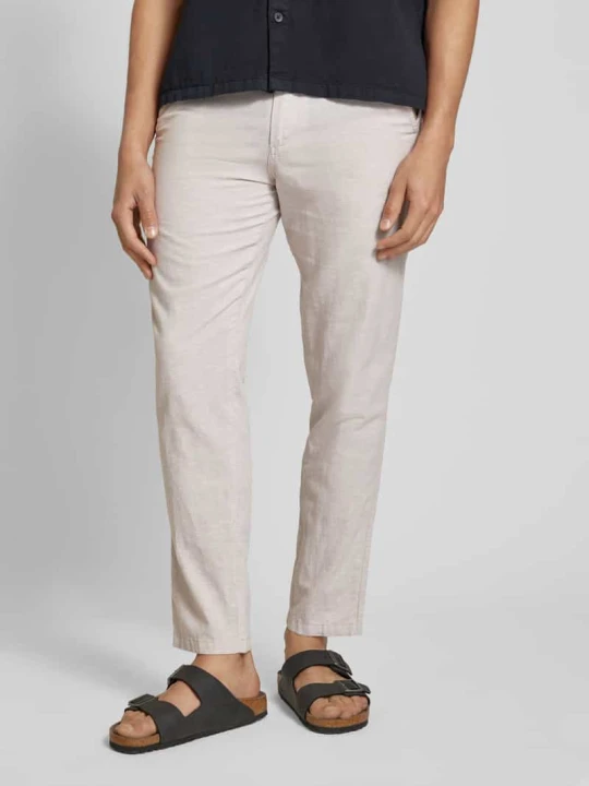 Zdjęcie produktu Chinosy o kroju tapered fit z wpuszczanymi kieszeniami model ‘STACE’ Jack&Jones Złamany biały melanż