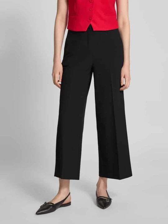 Zdjęcie produktu Chinosy o kroju tapered fit z wpuszczanymi kieszeniami Tommy Hilfiger czarny