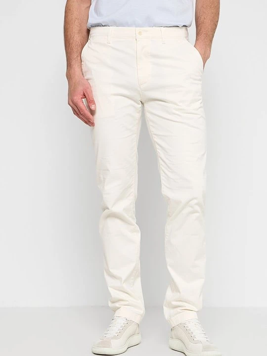 Zdjęcie produktu Chinosy Tommy Hilfiger mleczny