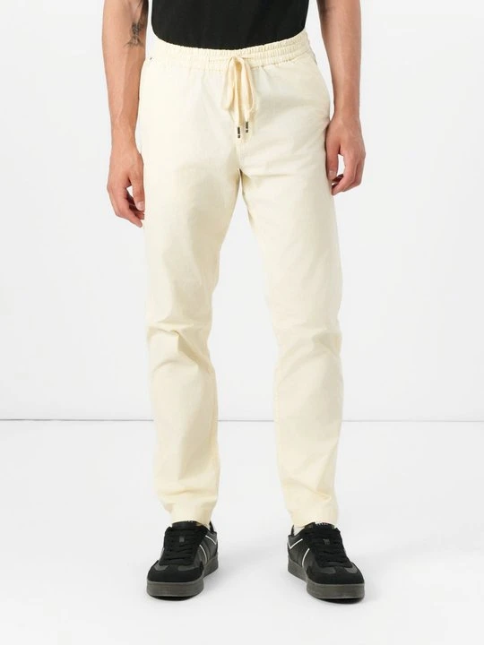 Zdjęcie produktu Chinosy Tommy Hilfiger mleczny
