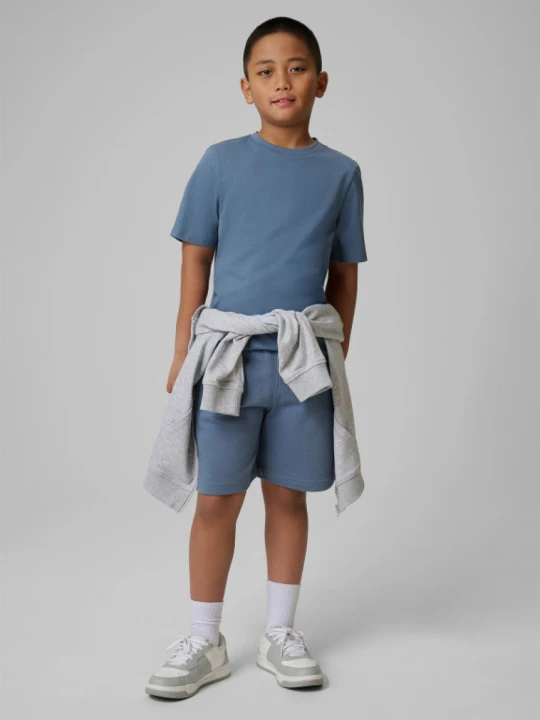Zdjęcie produktu Chłopięce spodenki dresowe 4F 4FJRSS26TSHOM0866 - denim