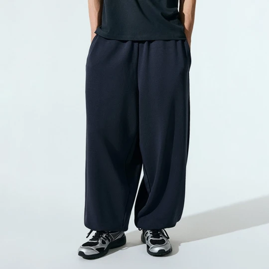 Zdjęcie produktu Ciemnogranatowe spodnie dresowe super baggy fit House granatowy