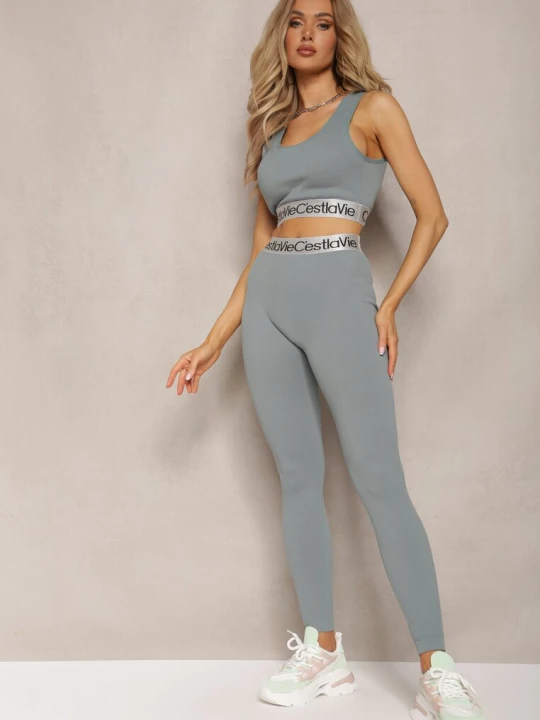 Zdjęcie produktu Ciemnozielone Sportowe Legginsy Elastyczne z Ozdobną Szeroką Gumą w Pasie Larnode Elsa.m By May Zielony
