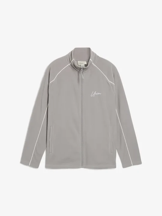 Zdjęcie produktu Ciepła bluza rozpinana z polaru, ze sportowymi detalami BonPrix szary