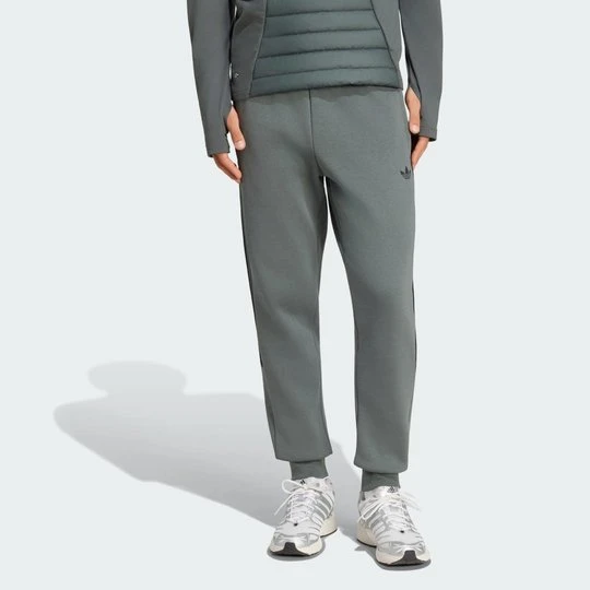 Zdjęcie produktu CIEPŁE SPODNIE TEAMGEIST 26 CUTLINE Adidas Legend Ivy