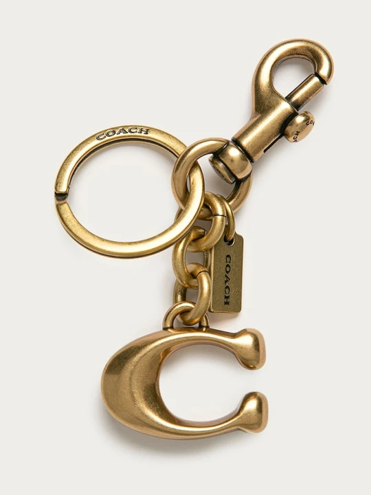 Zdjęcie produktu Coach - Brelok 1635 złoty