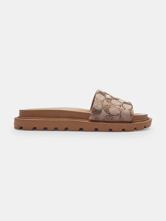 Zdjęcie produktu Coach klapki na płaskim obcasie damskie Brynn Crystal Signature Slide brązowy