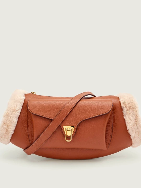 Zdjęcie produktu Coccinelle Skórzana torebka na ramię Coccinelle Beat | shearling brązowy