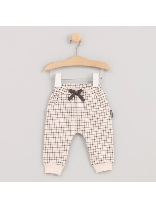 Zdjęcie produktu Cotton Fish Spodnie dresowe w kolorze beżowym rozmiar: 74
