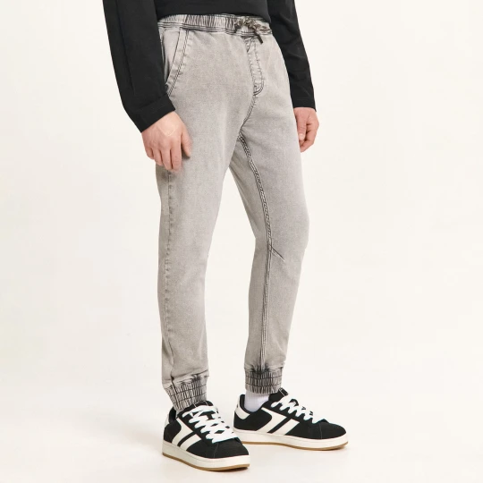 Zdjęcie produktu Cropp - Jeansowe joggery z dekoracyjnymi troczkami - jasny szary