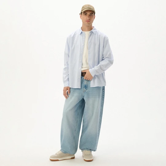 Zdjęcie produktu Cropp - Jeansy skater z efektem sprania - niebieski