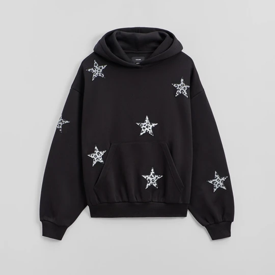 Zdjęcie produktu Czarna bluza z kapturem i gwiazdkami w panterkę House