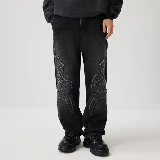 Zdjęcie produktu Czarne jeansy baggy fit z motywem tribal House