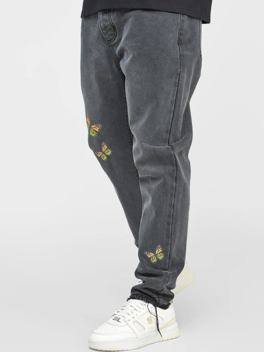 Zdjęcie produktu Czarne jeansy męskie z motywem motyla i prostym krojem SikSilk