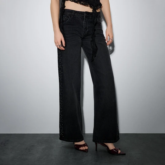 Zdjęcie produktu Czarne jeansy wide leg z kryształkami po bokach House
