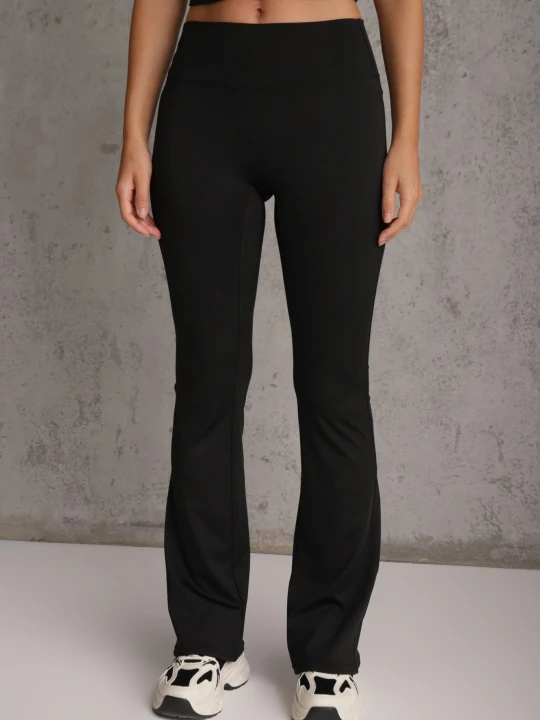 Zdjęcie produktu Czarne Legginsy Flare High Waist Ozdobione z Tyłu Modelującym Marszczeniem Deinoreia Yu & Me