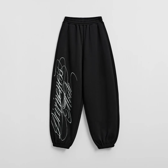 Zdjęcie produktu Czarne spodnie dresowe baggy z napisem House