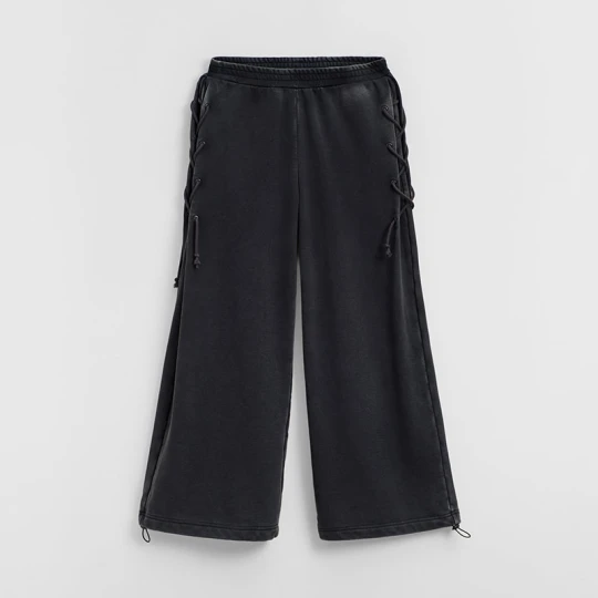 Zdjęcie produktu Czarne spodnie dresowe wide leg z wiązaniami House