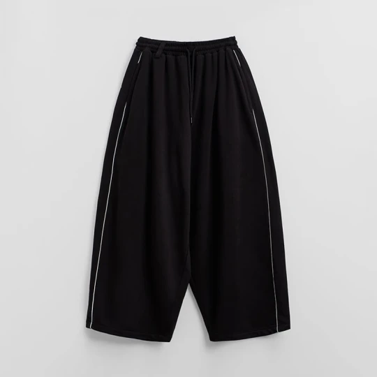 Zdjęcie produktu Czarne spodnie super baggy z lampasami House