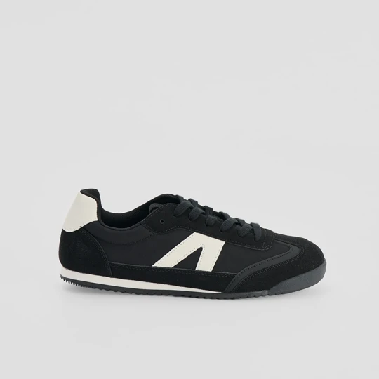 Zdjęcie produktu Czarno-białe sneakersy z łączonych materiałów House