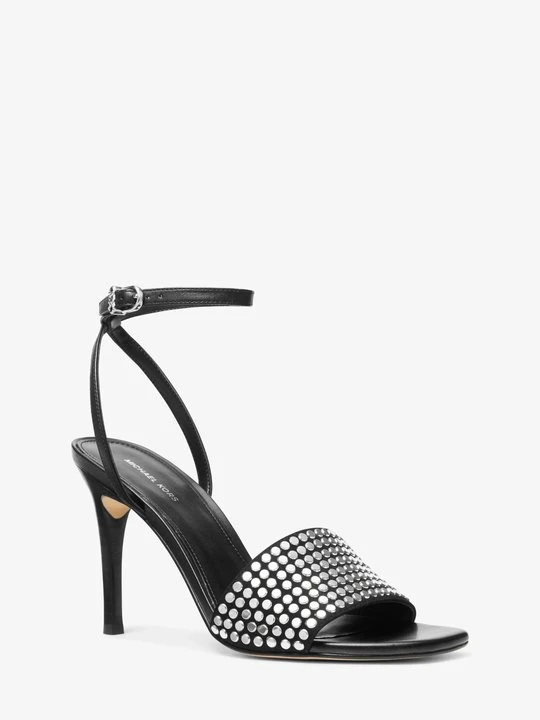 Zdjęcie produktu Czółenka Elyse z lakierowanej skóry Michael Kors CZARNY (Czarny)