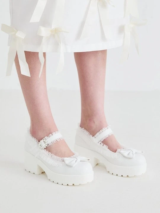 Zdjęcie produktu Czółenka na platformie Koi Footwear biały