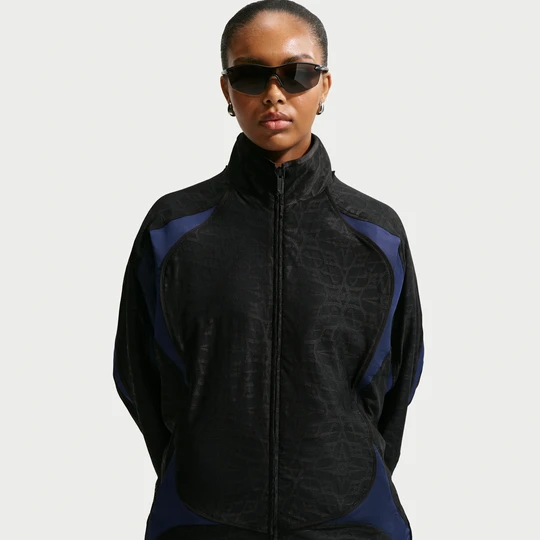 Zdjęcie produktu Damska bluza dresowa z koronką o kroju oversize Nike - Czerń
