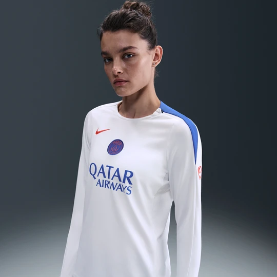 Zdjęcie produktu Damska dzianinowa koszulka piłkarska z półokrągłym dekoltem Nike Total 90 Dri-FIT Paris Saint-Germain Strike (wersja trzecia) - Biel