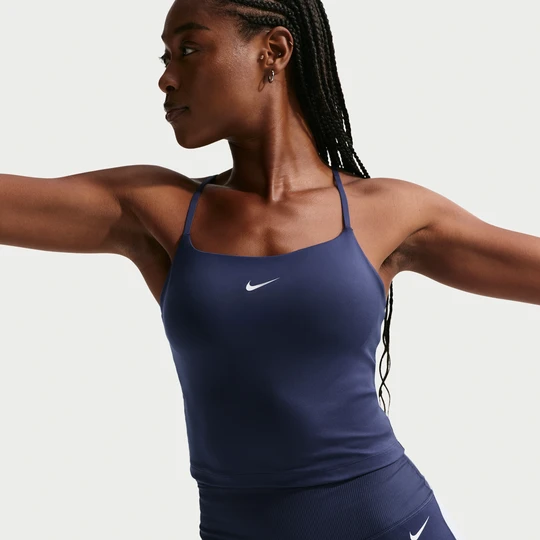 Zdjęcie produktu Damska koszulka bez rękawów lub stanik sportowy z regulacją i wkładkami zapewniający średnie wsparcie Nike One - Niebieski