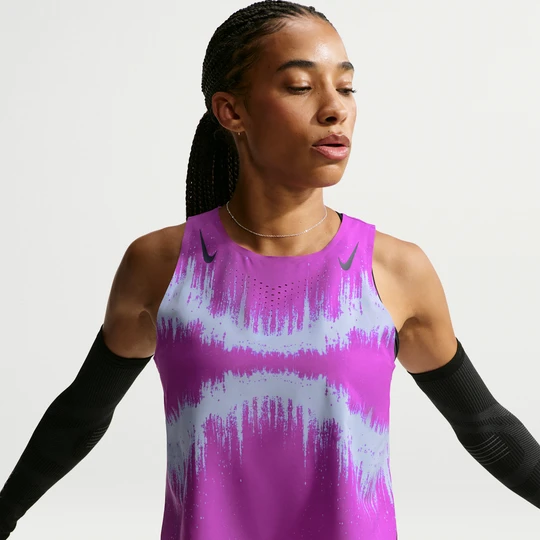 Zdjęcie produktu Damska koszulka bez rękawów o skróconym kroju do biegania Dri-FIT ADV Nike AeroSwift - Fiolet