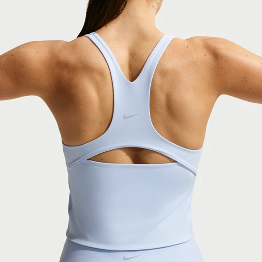 Zdjęcie produktu Damska koszulka bez rękawów z wbudowanym stanikiem zapewniającym lekkie wsparcie Nike Zenvy - Niebieski