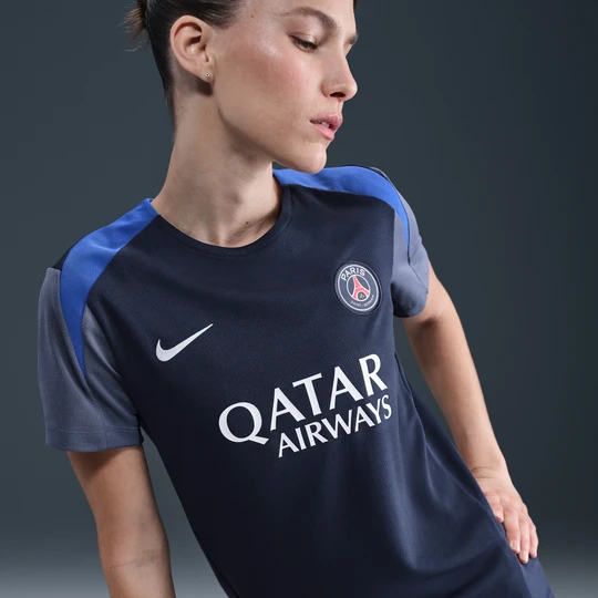 Zdjęcie produktu Damska koszulka piłkarska z krótkim rękawem Nike Dri-FIT Paris Saint-Germain Strike - Niebieski