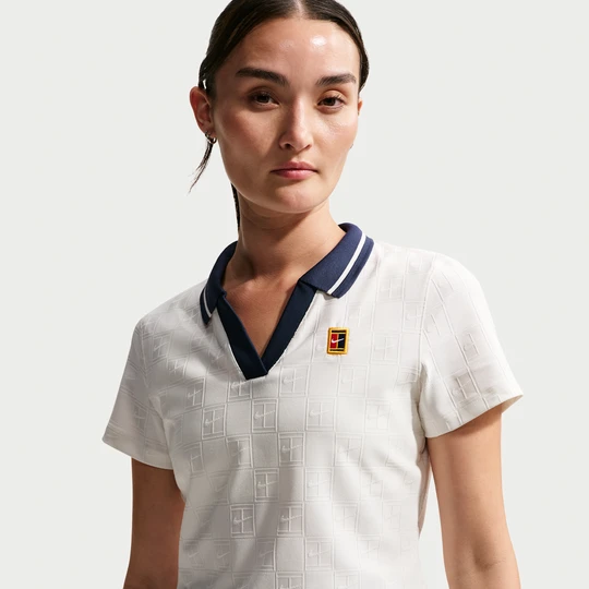 Zdjęcie produktu Damska koszulka polo do tenisa o skróconym kroju Dri-FIT NikeCourt - Biel