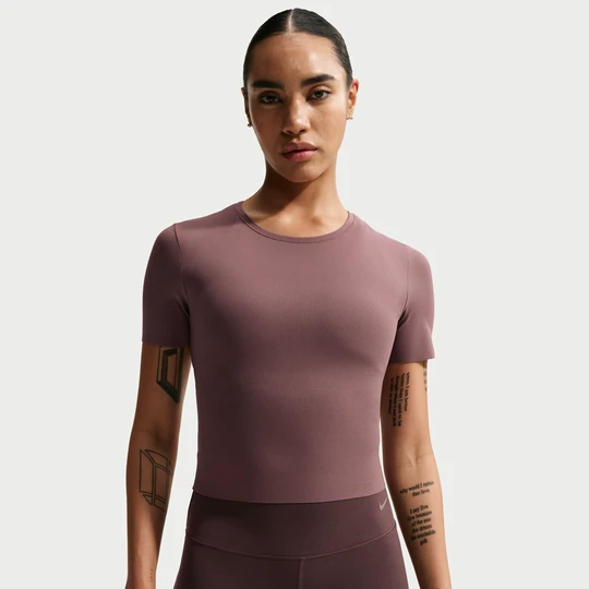 Zdjęcie produktu Damska koszulka z krótkim rękawem Dri-FIT Nike Zenvy - Fiolet