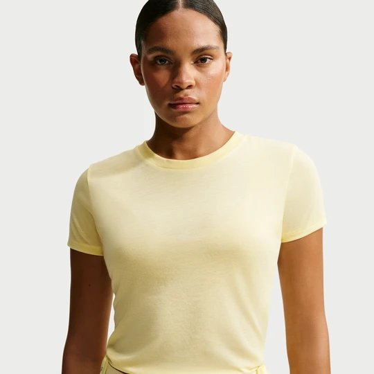 Zdjęcie produktu Damska koszulka z krótkim rękawem NikeSKIMS Performance Cotton Blend - Żółty