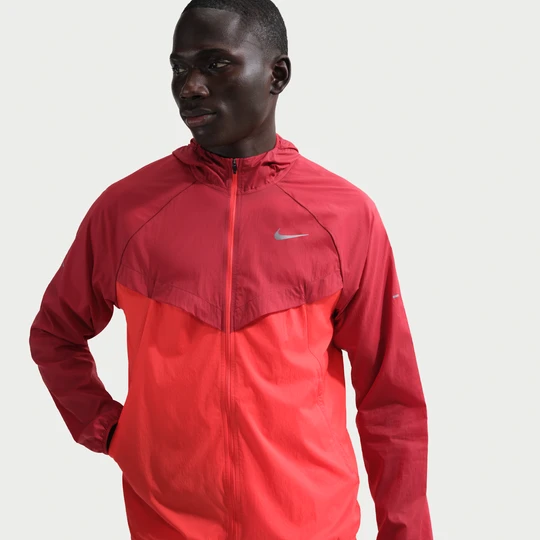 Zdjęcie produktu Damska kurtka do biegania z ochroną przed promieniowaniem UV Repel Nike Stride - Czerwony